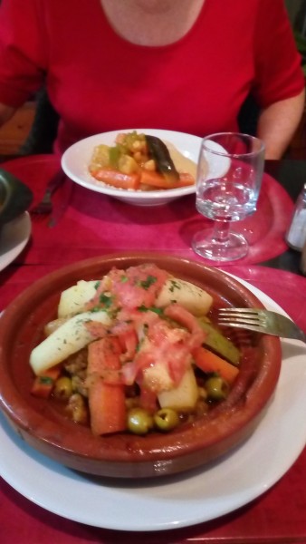 Tagine in foreground, couscous